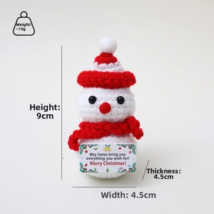 Handmade crochet snowman plush toy Christmas holiday home decor with red hat and scarf.
