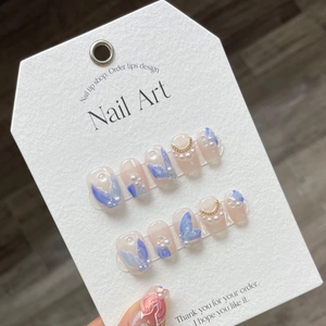 Handmade 3D mermaid press-on nails with blue butterfly art and pearls on pink base