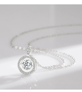 Macro detail of 925 sterling silver necklace with moving round cubic zirconia pendant
