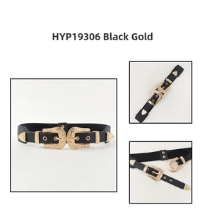 Detail of western double-buckle elastic belt with ornate gold floral engraving