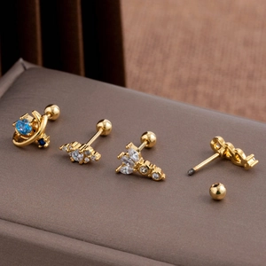 Set of four gold-plated zircon ear studs featuring sapphire planet and leaf designs