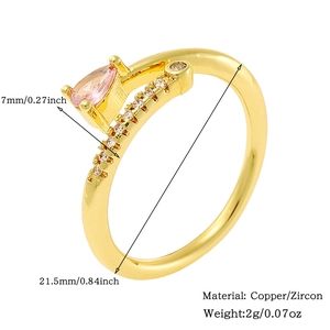 Detail view of 18K gold plated ring featuring pink teardrop zircon with size specifications