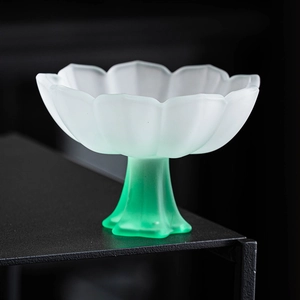 Elegant lotus-shaped frosted glass tea cup with white top and green gradient stem base