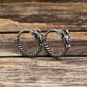 Vintage stainless steel dragon earrings with intricate silver scale details for men