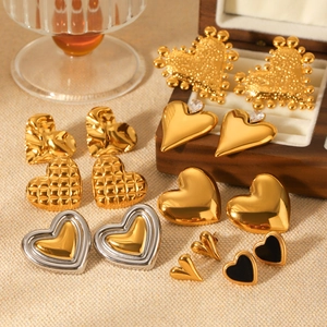 Collection of stainless steel heart earrings in gold silver and black with various textures