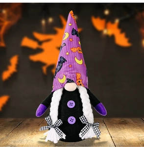 Macro shot of Halloween purple gnome with bat patterned hat and white braided pigtails