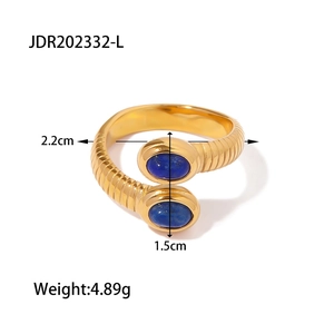 Detail view of gold snake ring with lapis lazuli stones and size measurements