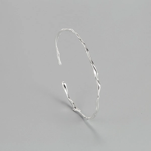 Minimalist S925 sterling silver open cuff bracelet with irregular liquid wave design