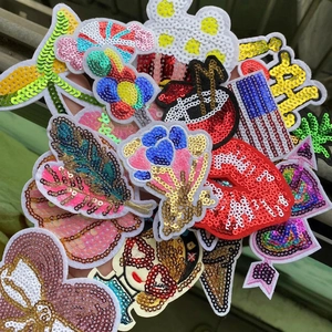 Assorted sequin embroidery patches featuring lips and bows for DIY garment decoration
