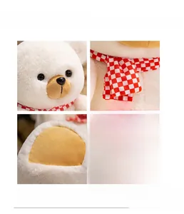 Detail of white plush teddy bear showing red checkered scarf and soft fur textures