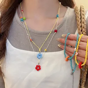 Colorful cat eye stone beaded flower pendant necklace and vibrant dopamine bracelet set