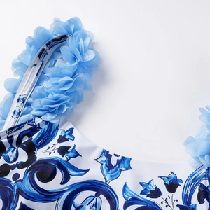 Blue porcelain floral one-piece swimsuit with 3D mesh flowers and backless design
