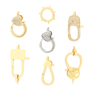 Selection of luxury gold heart and sun charms with micro-pave cubic zirconia accents