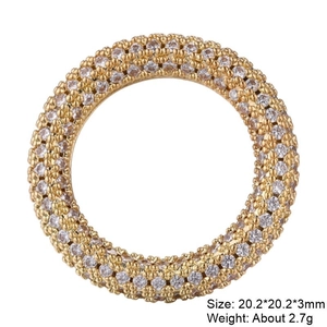Macro view of gold circular cubic zirconia link connector for DIY jewelry making