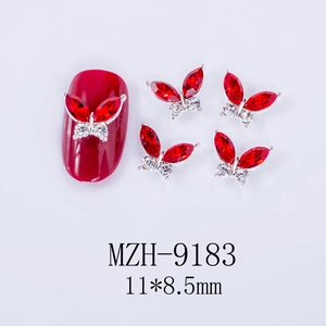 Macro view of red horse-eye 3D butterfly nail charms with 11x8.5mm size specs