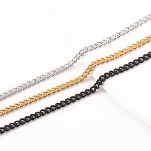 Detail of twisted curb chains in silver, gold and black finishes for men and women