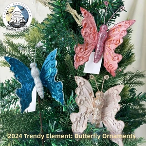 Glittering velvet butterfly ornaments in pink, blue, and cream for Christmas tree decor