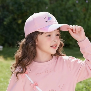 Close-up of pink unicorn baseball cap featuring sequin brim and sweet girl embroidery