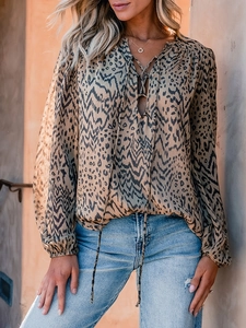 Women's leopard print long sleeve shirt with V-neck tie and relaxed fit design
