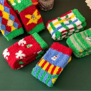 Cute Christmas coral fleece socks with festive patterns and warm plush texture