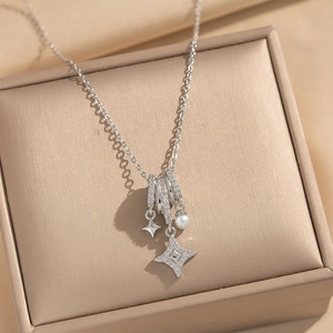Silver star pendant necklace with white pearl and micro-pave cubic zirconia on steel chain