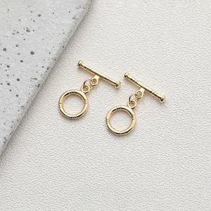 Close-up of decorative 14K gold-plated OT toggle clasp set for DIY jewelry crafting