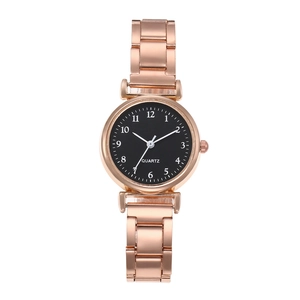Minimalist quartz watch with rose gold metal band and black dial for women
