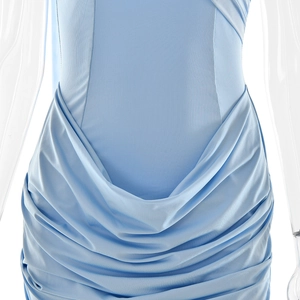 Detail of light blue pleated mesh dress showing the draped fabric texture on a mannequin