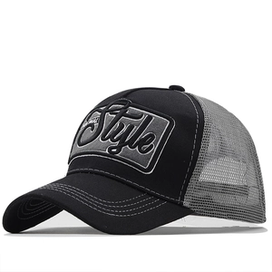 Macro detail of the breathable mesh back and 3D Style embroidery on this trucker hat