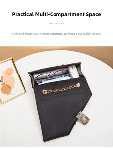 Detailed interior of black saddle bag showing multiple practical storage compartments