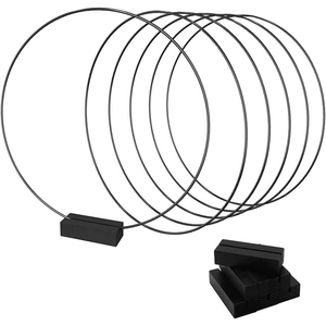 Macro shot of black metal floral hoops and rectangular wooden bases for wedding DIY decor