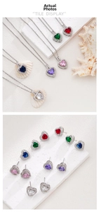 Detail of heart jewelry set featuring colorful zircon stones, necklace, and earrings