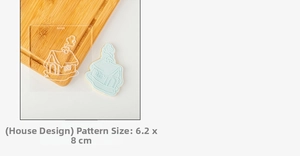 Makro-Detail der Keksausstecher-Form in Hausform für Fondant und weihnachtliches Backen