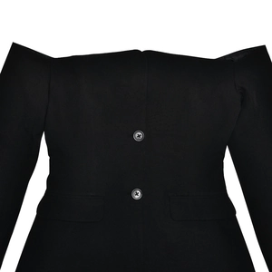 Close-up of black off-the-shoulder slim fit dress featuring front buttons and flap pockets