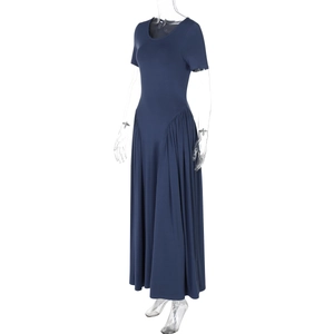 Detail of the elegant ruched waist and navy blue knit fabric on a short sleeve maxi dress