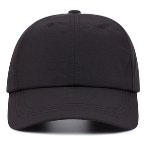 Minimalist black quick-dry baseball cap featuring a six-panel crown and curved sun visor