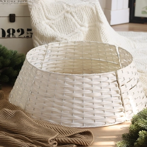 Minimalist white woven Christmas tree collar for holiday base decoration in cozy home setting