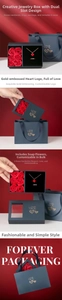 Detail of navy blue jewelry box with six red soap roses and gold foil logo gift bag