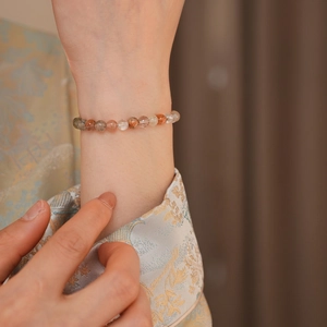 Elegant multi-color crystal bead bracelet on wrist with high transparency and vintage style