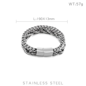 Close-up of silver-toned stainless steel dragon link bracelet for men with magnetic clasp