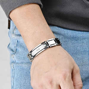 Men's two-tone stainless steel DAD bracelet with diamonds worn on wrist for fashion