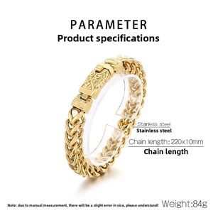 Detail view of gold stainless steel dragon bone chain bracelet with engraved buckle clasp