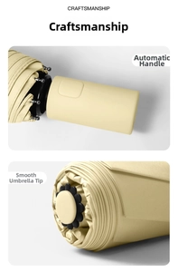 Detail of minimalist automatic beige umbrella featuring a round bead tip and power handle