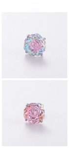 Macro shot of pink octagon-cut zircon stud earring with four-prong titanium steel setting