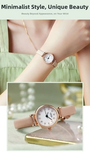 Close-up of minimalist rose gold watch with rhinestone dial and pink leather strap