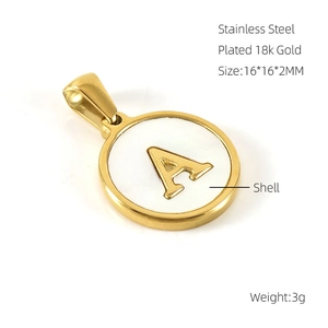 Macro shot of 18k gold plated stainless steel letter A pendant with shell inlay detail