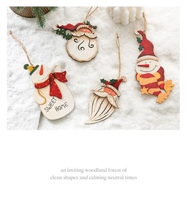 Detail of wooden Santa and Snowman ornaments with LED lights for Christmas tree decor