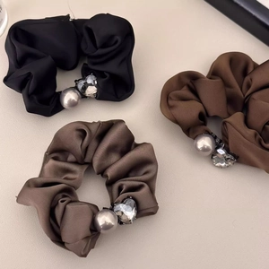 French camellia heart scrunchies in black, brown and coffee silk with pearl detail