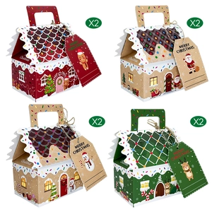 Detailed view of Christmas gingerbread house candy boxes with festive gift tags and handles
