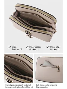 Multi-compartment beige crossbody bag with gold zippers and organized storage layers